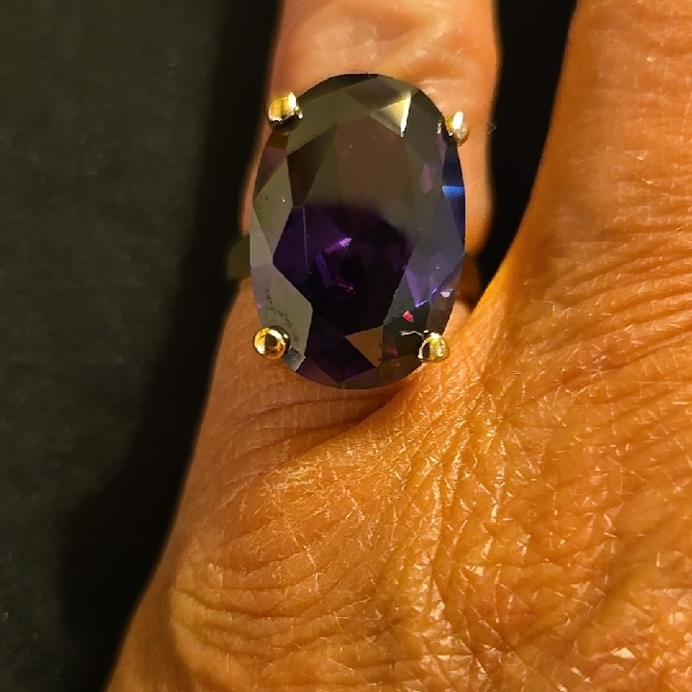 Elegant Purple Gemstone Ring with Gold Accents